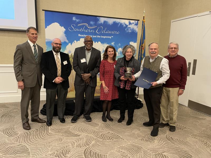 Gathered in recognition of Delaware Botanic Gardens’ 2022 Best Attraction award from Southern Delaware Tourism are (l-r) Rep. Ron Gray, R-Selbyville; Jamie Hayman and Peter Carter, board members; Carol McCloud, vice president; Sheryl Swed, executive director; Ray Sander, president and Brent Baker, secretary. SUBMITTED PHOTO
